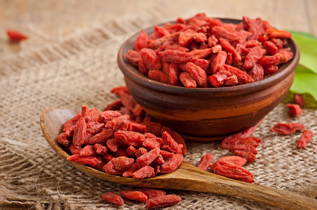 Gogi berries (in wooden blow and spoon), ideal for body health in spring - Tzu Chi Clinic Canada